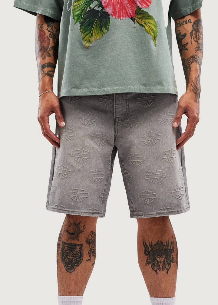 M SHIELD DEBOSSED PATTERN SHORTS